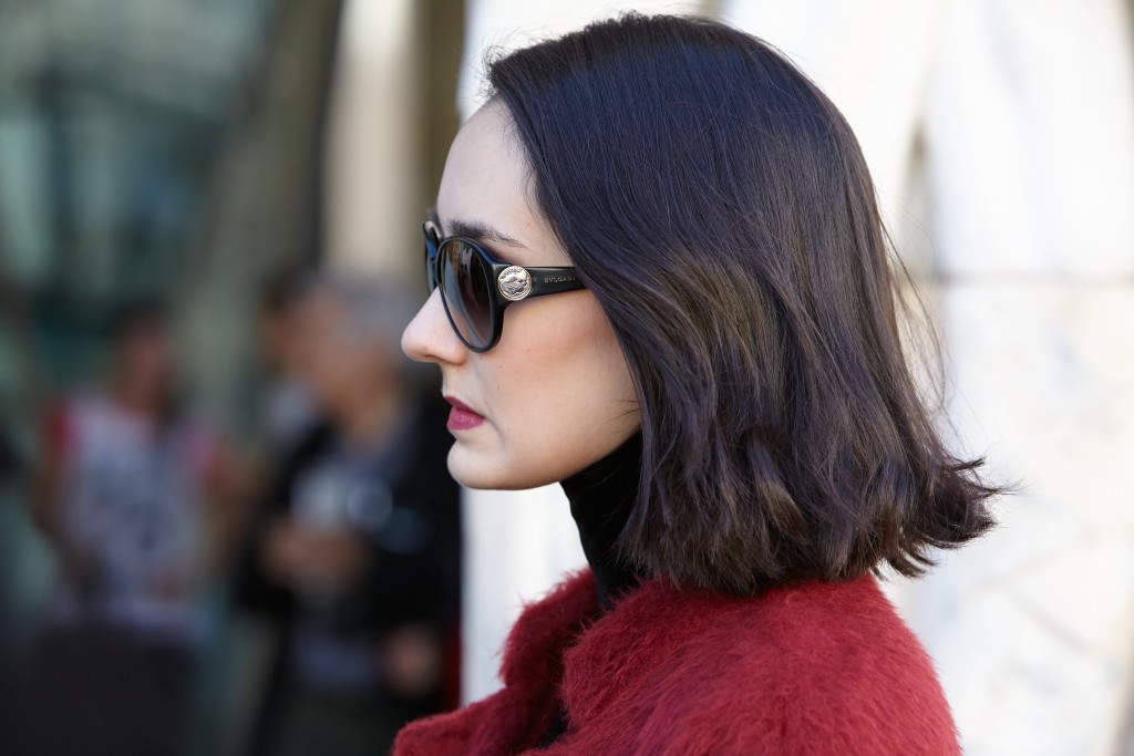 Sunglasses and red textured jacket from PFW